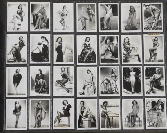 Three folio albums of cigarette cards on the themes of Entertainment Stars, Beauties and Famous People,